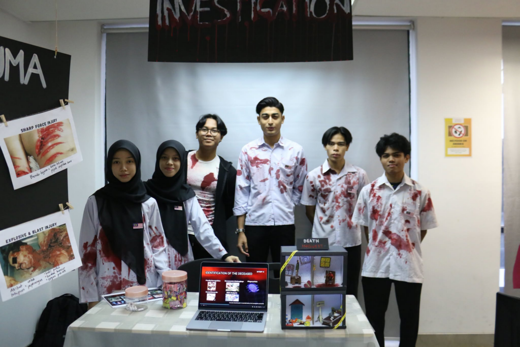 Diploma in Law Enforcement students presenting the Death Investigation Educational Booth at CAW 2026